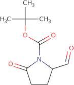 tert-Butyl (2S)-2-formyl-5-oxopyrrolidine-1-carboxylate