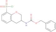 Benzyl N-[8-(chlorosulfonyl)-3,4-dihydro-2H-1-benzopyran-3-yl]carbamate