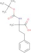 2-{[(tert-Butoxy)carbonyl]amino}-2-methyl-4-phenylbutanoic acid