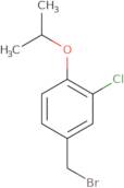 4-(Bromomethyl)-2-chloro-1-(propan-2-yloxy)benzene