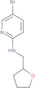 5-Bromo-N-[(oxolan-2-yl)methyl]pyridin-2-amine