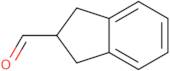 2,3-Dihydro-1H-indene-2-carbaldehyde
