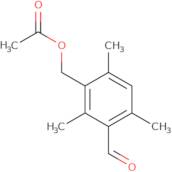 3-Formyl-2,4,6-trimethylbenzyl acetate