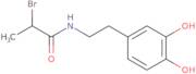 2-bromo-N-[2-(3,4-dihydroxyphenyl)ethyl]propanamide