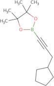 2-(3-Cyclopentyl-1-propyn-1-yl)-4,4,5,5-tetramethyl-1,3,2-dioxaborolane