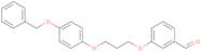 3-{3-[4-(Benzyloxy)phenoxy]propoxy}benzaldehyde