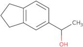 (1R)-1-(2,3-Dihydro-1H-inden-5-yl)ethan-1-ol