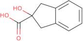 2-Hydroxy-2,3-dihydro-1H-indene-2-carboxylic acid