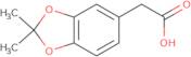 2-(2,2-Dimethyl-1,3-dioxaindan-5-yl)acetic acid