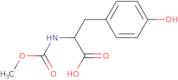 (2S)-3-(4-Hydroxyphenyl)-2-[(methoxycarbonyl)amino]propanoic acid