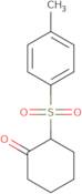 2-(4-Methylbenzenesulfonyl)cyclohexan-1-one