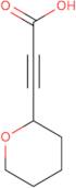 3-(Oxan-2-yl)prop-2-ynoic acid