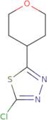 2-Chloro-5-(oxan-4-yl)-1,3,4-thiadiazole