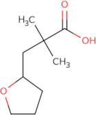 2,2-Dimethyl-3-(oxolan-2-yl)propanoic acid