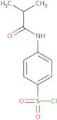 4-(2-Methylpropanamido)benzene-1-sulfonyl chloride