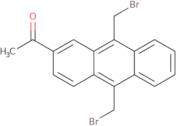 1-[9,10-Bis(bromomethyl)-2-anthracenyl]ethanone