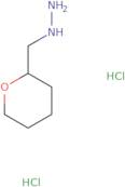 (Oxan-2-ylmethyl)hydrazine dihydrochloride