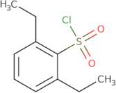 2,6-Diethylbenzene-1-sulfonyl chloride