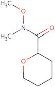 N-Methoxy-N-methyloxane-2-carboxamide