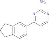 4-(2,3-Dihydro-1H-inden-5-yl)pyrimidin-2-amine