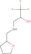 1,1,1-Trifluoro-3-[(tetrahydrofuran-2-ylmethyl)amino]propan-2-ol