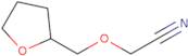 2-[(Oxolan-2-yl)methoxy]acetonitrile