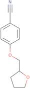 4-(Oxolan-2-ylmethoxy)benzonitrile