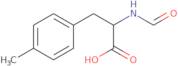 2-Formamido-3-(4-methylphenyl)propanoic acid