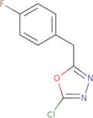 2-Chloro-5-[(4-fluorophenyl)methyl]-1,3,4-oxadiazole