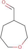 Oxepane-4-carbaldehyde