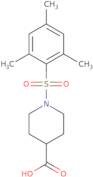 1-(2,4,6-Trimethylbenzenesulfonyl)piperidine-4-carboxylic acid