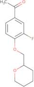 1-[3-Fluoro-4-(oxan-2-ylmethoxy)phenyl]ethan-1-one