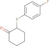 2-[(4-Fluorophenyl)sulfanyl]cyclohexan-1-one