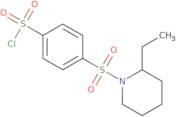 4-[(2-Ethylpiperidin-1-yl)sulfonyl]benzenesulfonyl chloride