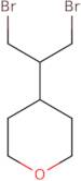 4-(1,3-Dibromopropan-2-yl)oxane