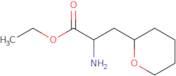 Ethyl 2-amino-3-(oxan-2-yl)propanoate