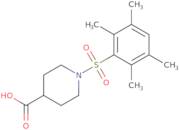 1-(2,3,5,6-Tetramethylbenzenesulfonyl)piperidine-4-carboxylic acid