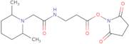 2,5-Dioxo-1-pyrrolidinyl 3-[2-(2,6-dimethyl-1-piperidyl)acetamido]propanoate