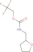 2,2,2-Trifluoroethyl N-(oxolan-2-ylmethyl)carbamate