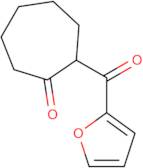 2-(Furan-2-carbonyl)cycloheptan-1-one