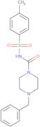 N-((4-methylphenyl)sulfonyl)(4-benzylpiperazinyl)formamide