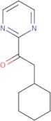 2-Cyclohexyl-1-(pyrimidin-2-yl)ethan-1-one