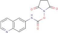 6-Aminoquinolyl-N-hydroxysuccinimidyl carbamate