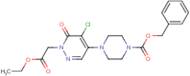 4-[5-Chloro-1-(2-ethoxy-2-oxoethyl)-6-oxo-1,6-dihydropyridazin-4-yl]piperazine, N1-CBZ protected