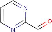 Pyrimidine-2-carboxaldehyde