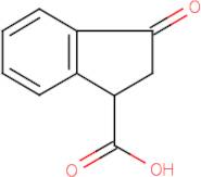 3-oxoindane-1-carboxylic acid