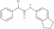 2-Bromo-N-(2,3-dihydro-1H-inden-5-yl)-2-phenylacetamide