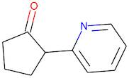 2-(Pyridin-2-yl)cyclopentan-1-one