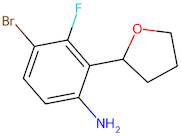 4-Bromo-3-fluoro-2-(tetrahydrofuran-2-yl)aniline