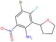 4-Bromo-3-fluoro-6-nitro-2-(tetrahydrofuran-2-yl)aniline